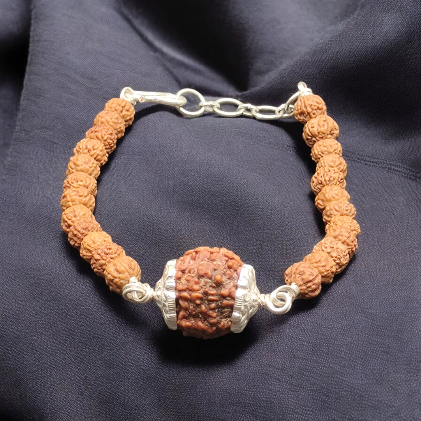 Nepali 7 Mukhi Rudraksha Silver Capped Bracelet