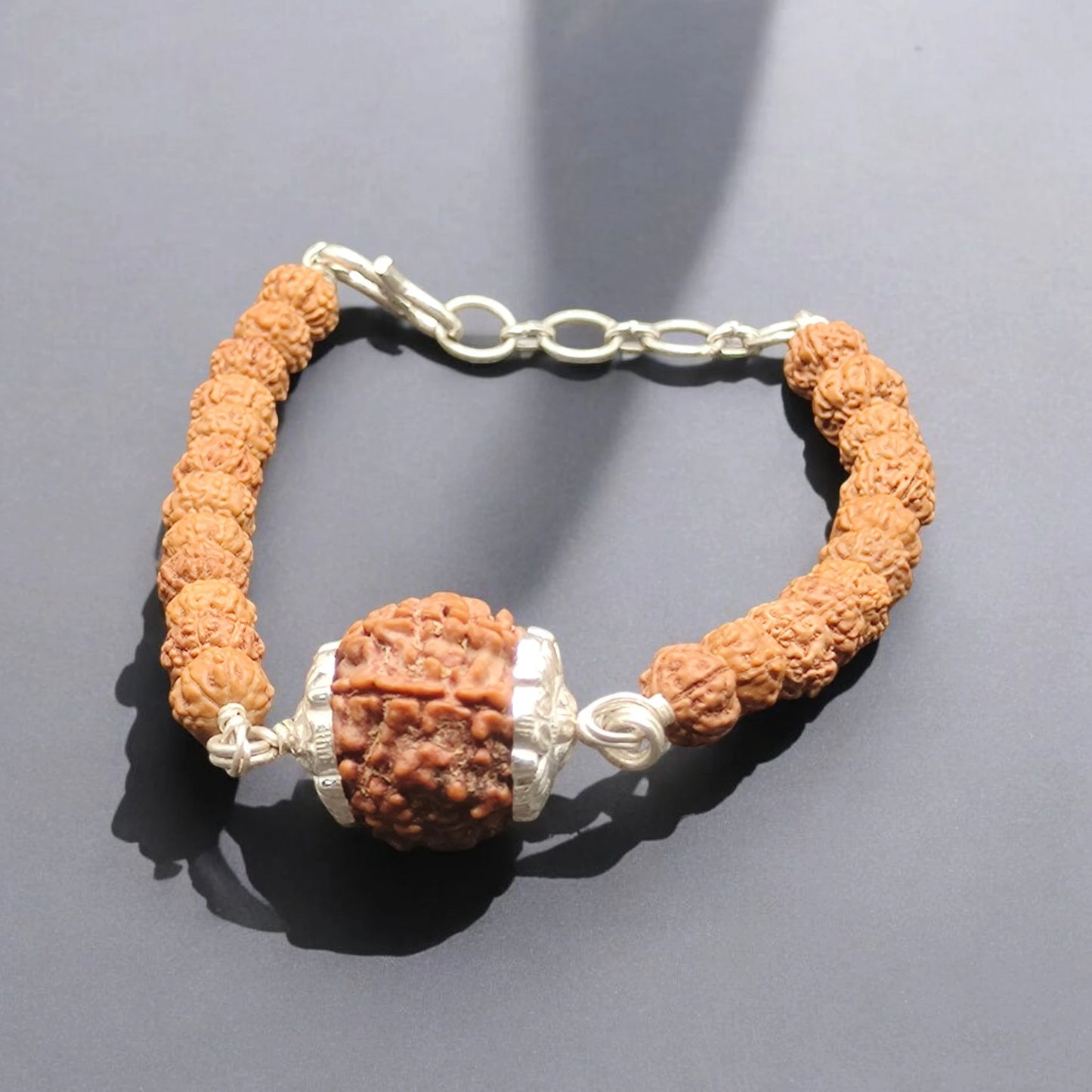 Nepali 7 Mukhi Rudraksha Silver Capped Bracelet